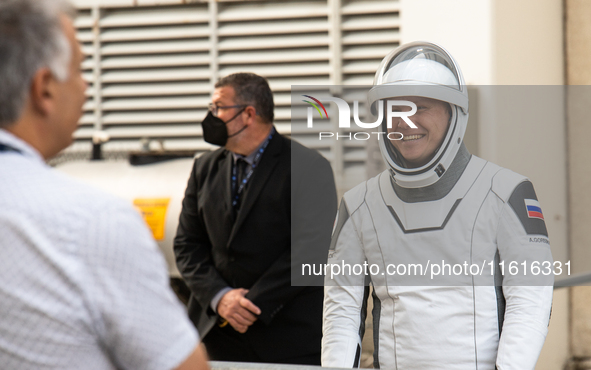 Cosmonaut Alexander Gorbunov from Russia talks with his family before heading to the launch pad 40 at the Cape Canaveral Space Force Station...