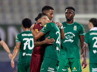 Thaylor Aldama of Gzira United and Nicolas Marias Garcia of Floriana hug each other after the Malta 360 Sports Premier League soccer match b...