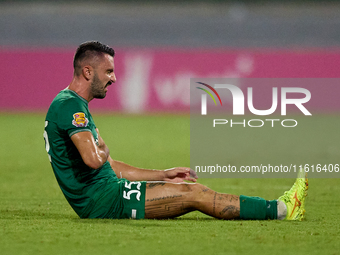 Alexandros Kouro of Floriana lies injured on the pitch after the Malta 360 Sports Premier League soccer match between Floriana and Gzira Uni...