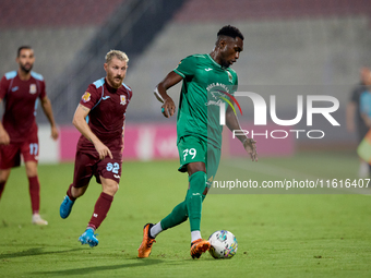 Cedric Serge Guy Yameogo (R) of Floriana is in action during the Malta 360 Sports Premier League soccer match between Floriana and Gzira Uni...