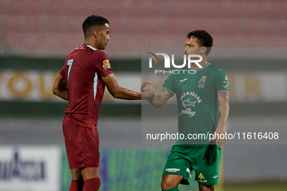 Thaylor Aldama of Gzira United and Augusto Fernando De Araujo Rodrigues of Floriana shake hands after the Malta 360 Sports Premier League so...