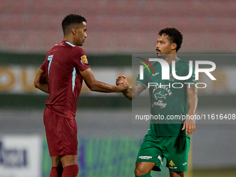 Thaylor Aldama of Gzira United and Augusto Fernando De Araujo Rodrigues of Floriana shake hands after the Malta 360 Sports Premier League so...