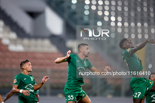 Floriana soccer players Nicolas Marias Garcia (L), Alexandros Kouro (C), and Franklin Sasere (R) are in action during the Malta 360 Sports P...