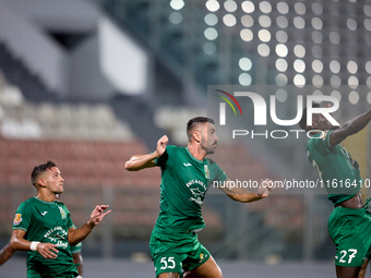 Floriana soccer players Nicolas Marias Garcia (L), Alexandros Kouro (C), and Franklin Sasere (R) are in action during the Malta 360 Sports P...