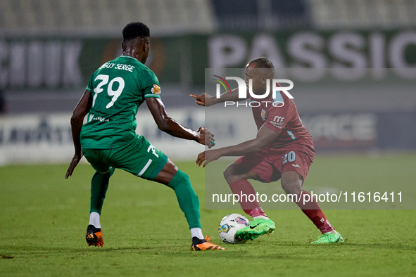 Alex Da Paixao Alves (R) of Gzira United is opposed by Cedric Serge Guy Yameogo (L) of Floriana during the Malta 360 Sports Premier League s...