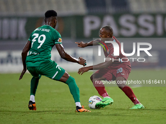 Alex Da Paixao Alves (R) of Gzira United is opposed by Cedric Serge Guy Yameogo (L) of Floriana during the Malta 360 Sports Premier League s...