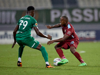 Alex Da Paixao Alves (R) of Gzira United is opposed by Cedric Serge Guy Yameogo (L) of Floriana during the Malta 360 Sports Premier League s...