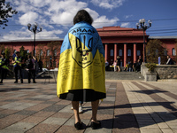 Ukrainians attend a march marking the upcoming Defenders of Ukraine Day in Kyiv, Ukraine, on September 28, 2024 (