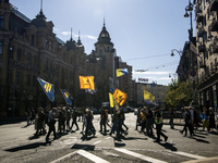 Ukrainians attend a march marking the upcoming Defenders of Ukraine Day in Kyiv, Ukraine, on September 28, 2024 (