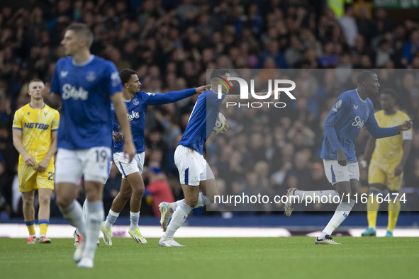 Dwight McNeil #7 of Everton F.C. celebrates his goal during the Premier League match between Everton and Crystal Palace at Goodison Park in...