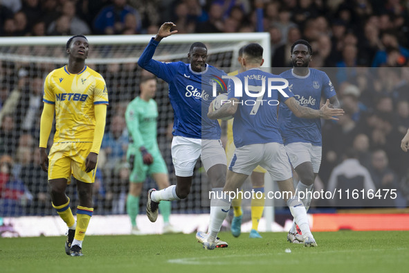 Dwight McNeil #7 of Everton F.C. celebrates his goal during the Premier League match between Everton and Crystal Palace at Goodison Park in...