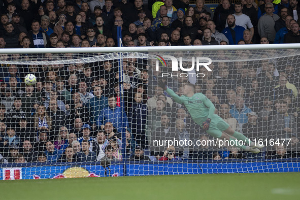 Dwight McNeil #7 of Everton F.C. scores a goal during the Premier League match between Everton and Crystal Palace at Goodison Park in Liverp...