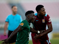 Frankin Sasere (front) of Floriana and Luis Carlos Riascos (back) grapple for position during the Malta 360 Sports Premier League soccer mat...