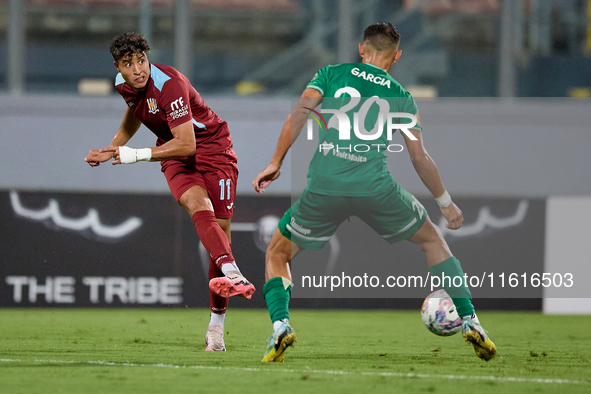 Chouaib Faysal (L) of Gzira United is in action during the Malta 360 Sports Premier League soccer match between Floriana and Gzira United at...