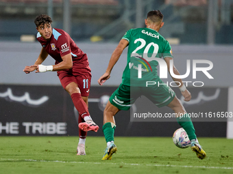 Chouaib Faysal (L) of Gzira United is in action during the Malta 360 Sports Premier League soccer match between Floriana and Gzira United at...