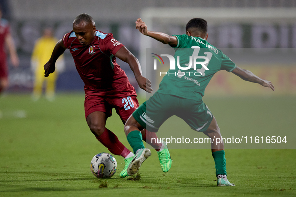 Alex Da Paixao Alves (L) of Gzira United is in action during the Malta 360 Sports Premier League soccer match between Floriana and Gzira Uni...