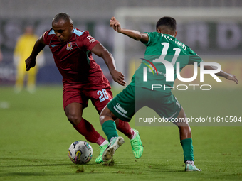 Alex Da Paixao Alves (L) of Gzira United is in action during the Malta 360 Sports Premier League soccer match between Floriana and Gzira Uni...