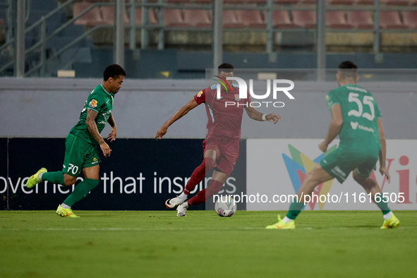 Thiago Aldama (C) of Gzira United is in action during the Malta 360 Sports Premier League soccer match between Floriana and Gzira United at...