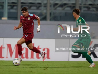 Chouaib Faysal (L) of Gzira United is in action during the Malta 360 Sports Premier League soccer match between Floriana and Gzira United at...