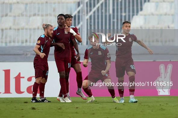 Gabriel Bohrer Mentz (second from right) of Gzira United reacts in celebration after scoring the 1-1 goal during the Malta 360 Sports Premie...