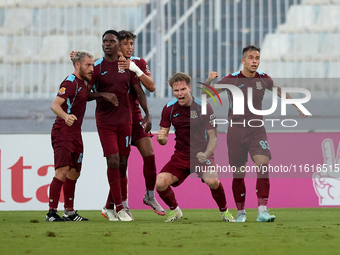 Gabriel Bohrer Mentz (second from right) of Gzira United reacts in celebration after scoring the 1-1 goal during the Malta 360 Sports Premie...