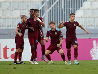 Gabriel Bohrer Mentz (second from right) of Gzira United reacts in celebration after scoring the 1-1 goal during the Malta 360 Sports Premie...