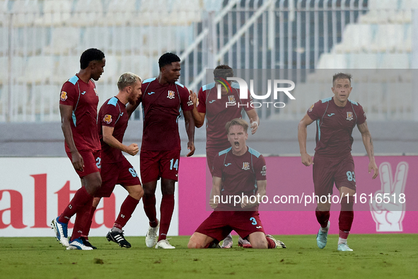 Gabriel Bohrer Mentz (second from right) of Gzira United reacts in celebration after scoring the 1-1 goal during the Malta 360 Sports Premie...