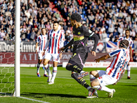 PSV Eindhoven midfielder Malik Tillman and Willem II defender Mickael Tirpan during the match Willem II vs. PSV at the Koning Willem II stad...