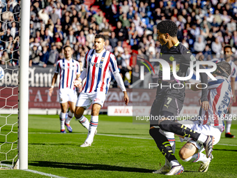 PSV Eindhoven midfielder Malik Tillman and Willem II defender Mickael Tirpan during the match Willem II vs. PSV at the Koning Willem II stad...