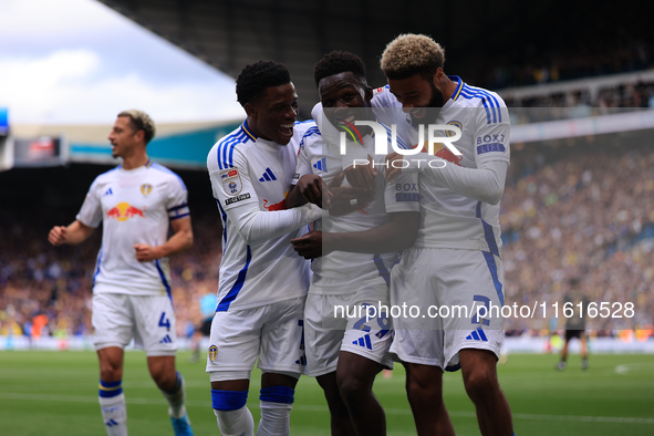 Wilfried Gnonto (Leeds United) celebrates with Largie Ramazani (Leeds United) and Jayden Bogle (Leeds United) during the Sky Bet Championshi...