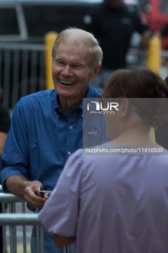 Astronaut, US Senator, and NASA Director Bill Nelson talks with astronaut Nick Hague's family during the Crew 9 walkout 