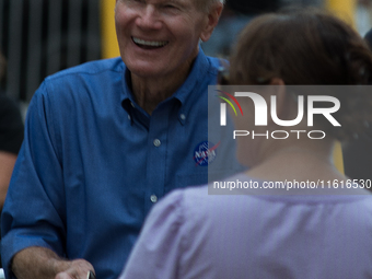 Astronaut, US Senator, and NASA Director Bill Nelson talks with astronaut Nick Hague's family during the Crew 9 walkout (