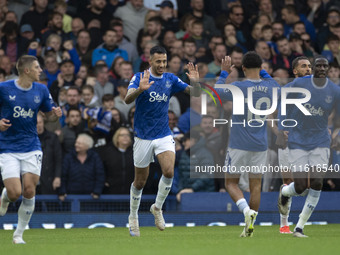 Dwight McNeil #7 of Everton F.C. celebrates his goal during the Premier League match between Everton and Crystal Palace at Goodison Park in...