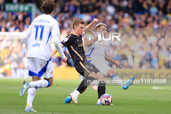 Ethan Ampadu (Leeds United) goes off injured after a challenge with Ben Sheaf (Coventry City) during the Sky Bet Championship match between...