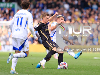 Ethan Ampadu (Leeds United) goes off injured after a challenge with Ben Sheaf (Coventry City) during the Sky Bet Championship match between...