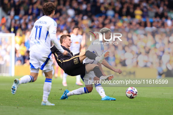 Ethan Ampadu (Leeds United) goes off injured after a challenge with Ben Sheaf (Coventry City) during the Sky Bet Championship match between...