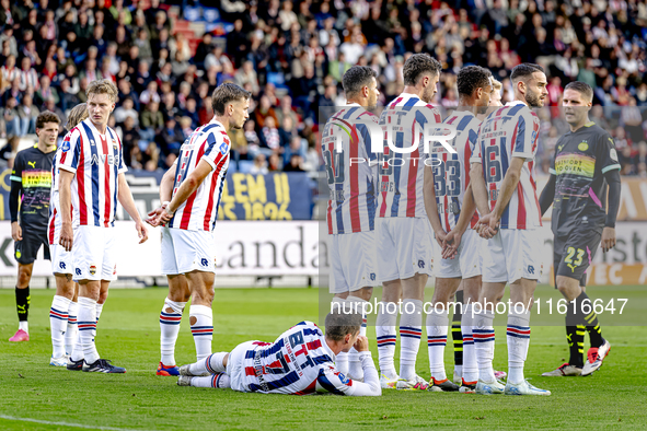 PSV takes a free kick while Willem II forward Nick Doodeman is on the ground during the match Willem II vs. PSV at the Koning Willem II stad...