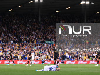 Ethan Ampadu (Leeds United) goes off injured after a challenge with Ben Sheaf (Coventry City) during the Sky Bet Championship match between...