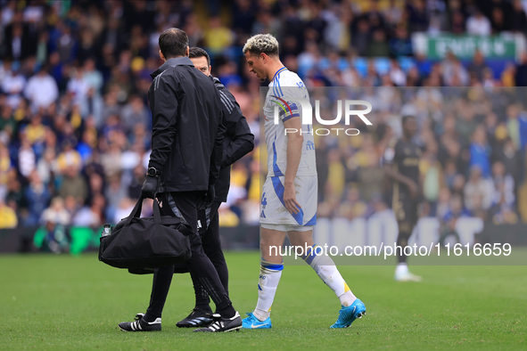 Ethan Ampadu (Leeds United) goes off injured after a challenge with Ben Sheaf (Coventry City) during the Sky Bet Championship match between...