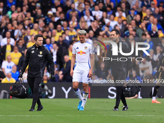 Ethan Ampadu (Leeds United) goes off injured after a challenge with Ben Sheaf (Coventry City) during the Sky Bet Championship match between...