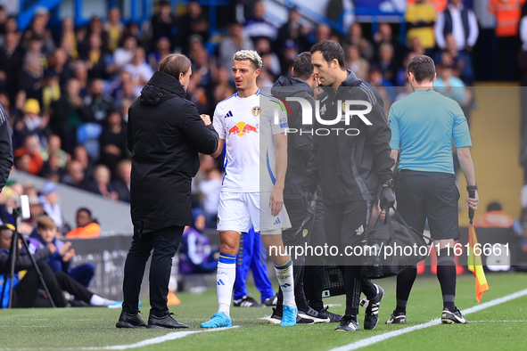 Ethan Ampadu (Leeds United) goes off injured after a challenge with Ben Sheaf (Coventry City) during the Sky Bet Championship match between...