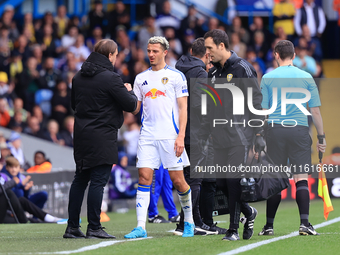 Ethan Ampadu (Leeds United) goes off injured after a challenge with Ben Sheaf (Coventry City) during the Sky Bet Championship match between...