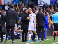 Ethan Ampadu (Leeds United) goes off injured after a challenge with Ben Sheaf (Coventry City) during the Sky Bet Championship match between...