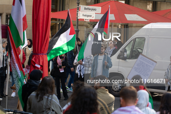 About a hundred pro-Palestinian protesters gather in Bonn, Germany, on September 28, 2024, and protest against Israel's attack in Lebanon, d...