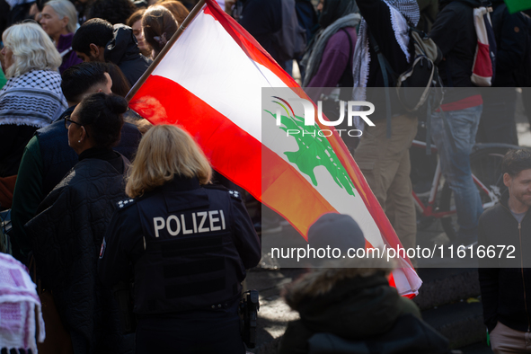 About a hundred pro-Palestinian protesters gather in Bonn, Germany, on September 28, 2024, and protest against Israel's attack in Lebanon, d...