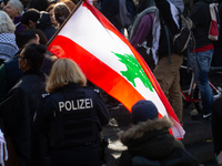 About a hundred pro-Palestinian protesters gather in Bonn, Germany, on September 28, 2024, and protest against Israel's attack in Lebanon, d...