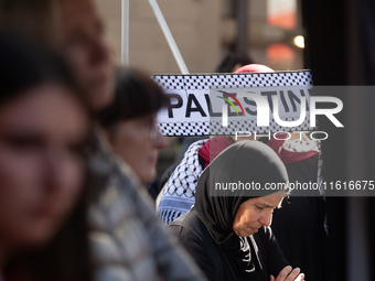 About a hundred pro-Palestinian protesters gather in Bonn, Germany, on September 28, 2024, and protest against Israel's attack in Lebanon, d...