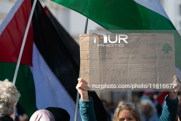 About a hundred pro-Palestinian protesters gather in Bonn, Germany, on September 28, 2024, and protest against Israel's attack in Lebanon, d...