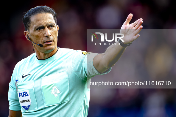 Referee Serdar Gozubuyuk officiates the match between Willem II and PSV at the Koning Willem II stadium for the Dutch Eredivisie season 2024...