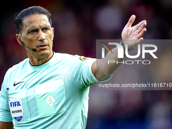 Referee Serdar Gozubuyuk officiates the match between Willem II and PSV at the Koning Willem II stadium for the Dutch Eredivisie season 2024...